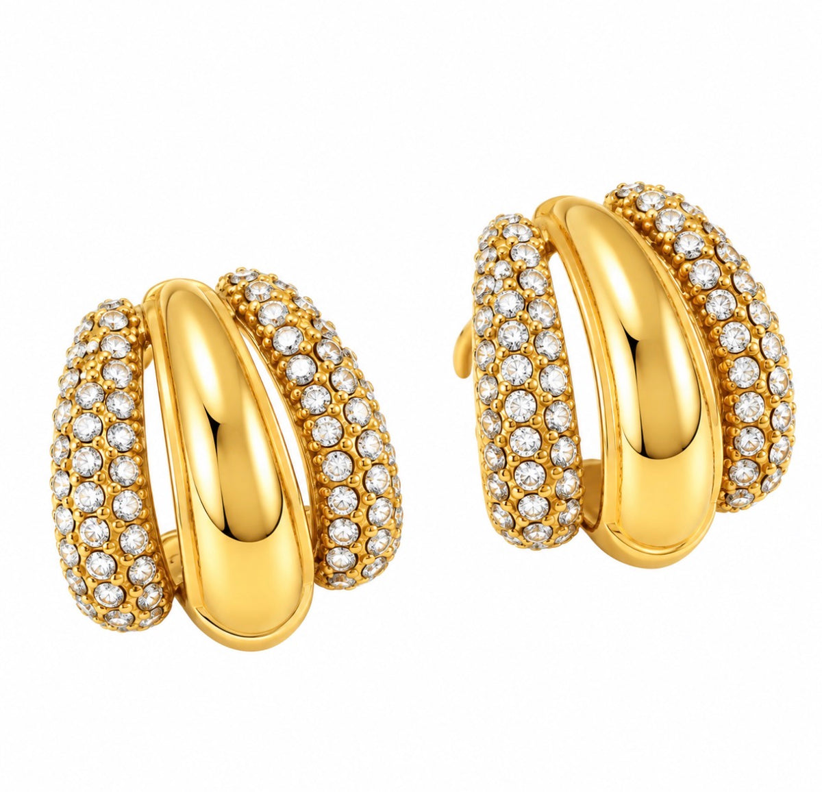 Gold triple row pave cz huggie hoop earrings chunky statement jewelry on white background.