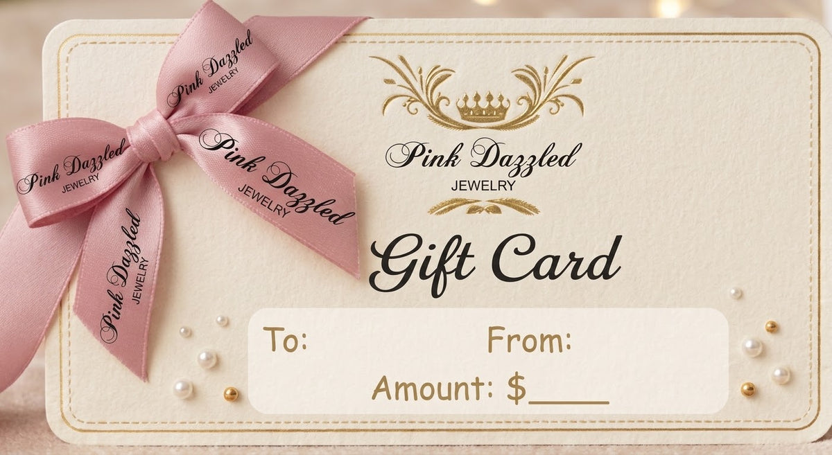 Pink Dazzled Jewelry gift card with pink ribbon and gold accents